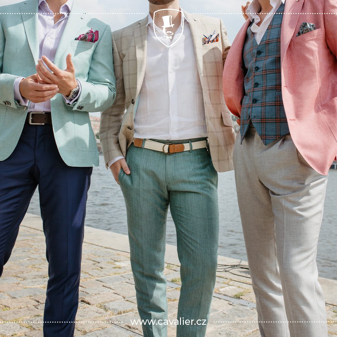 Three men in mint, beige and pink jackets with contrasting trousers.