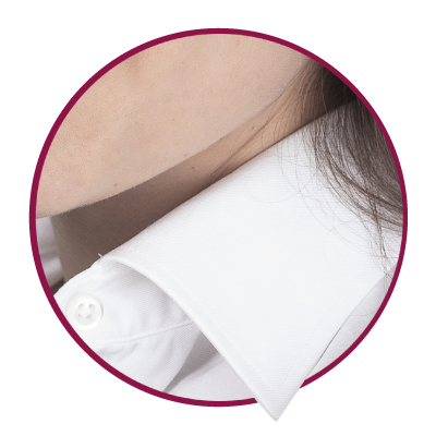 Pointed collar of a white blouse.