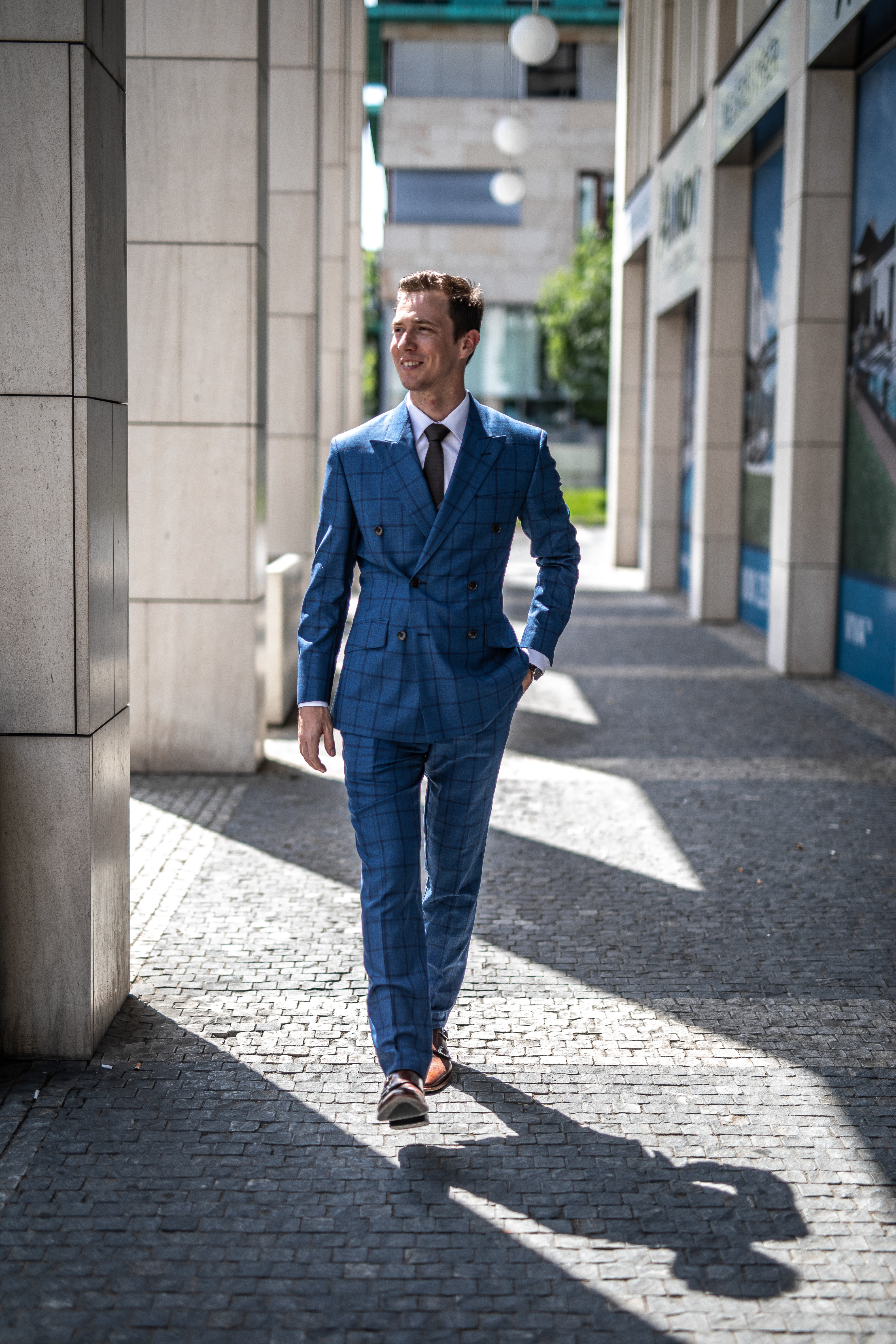 Miloš Kubelka wearing a blue checked Cavalier suit.