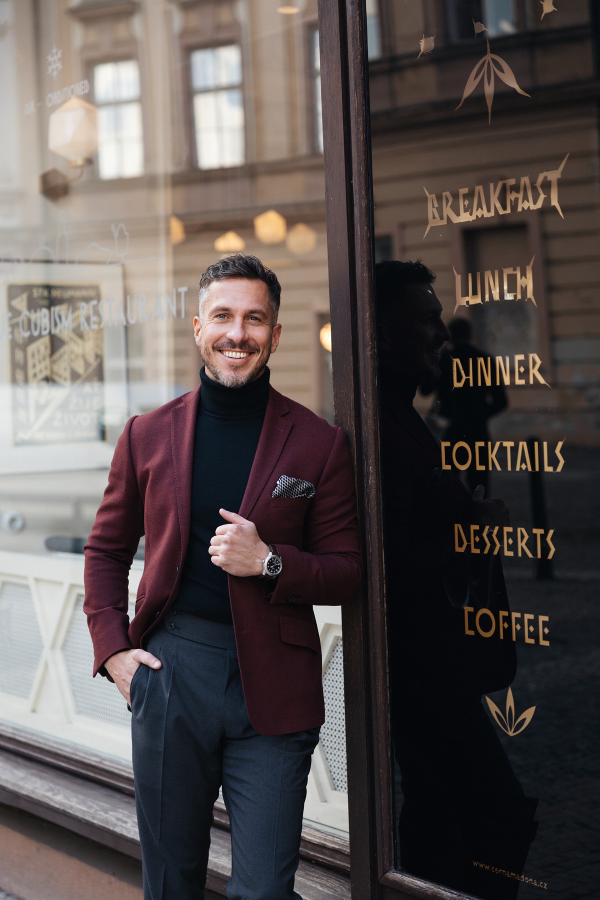 Petr Soler in a burgundy Cavalier blazer with a black turtleneck