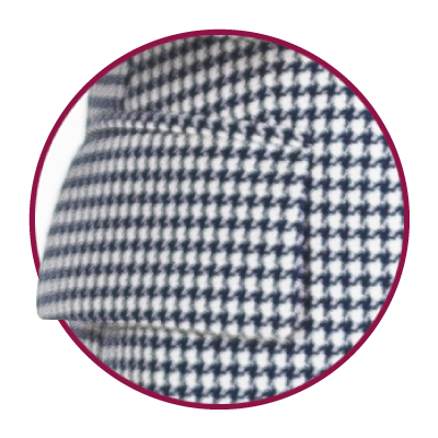 Close-up of a black-and-white houndstooth pattern.