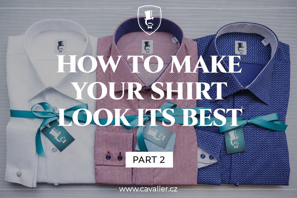 Three folded white, pink and blue shirts with ribbon
